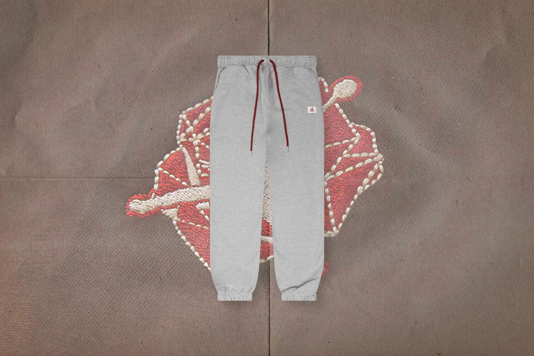 Jordan x Teyana Taylor Women’s Fleece Pants - Dark Grey Heather/Team Red