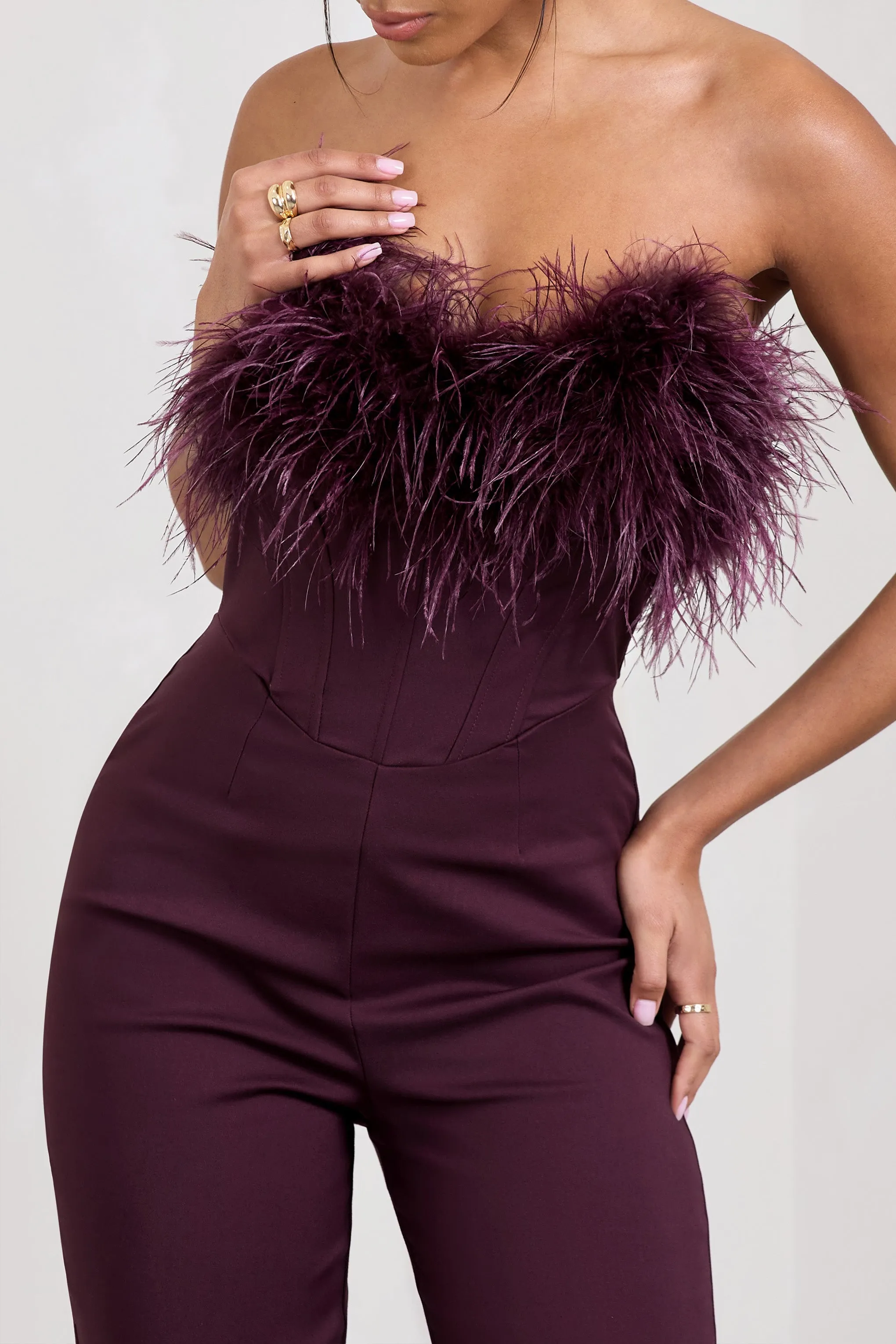 Tessa | Burgundy Shaped Neckline Corset Jumpsuit With Feather Trim Detail